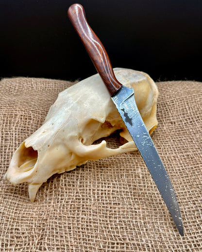 The Reef 7" fillet knife with laser-engraved walleye on an acid splash blade